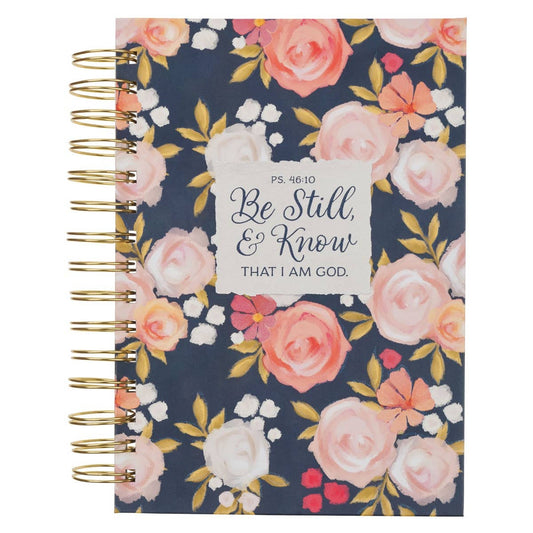Spiral-bound Christian journal with Be Still Ps. 46:10 cover design, featuring inspirational scripture and floral accents.