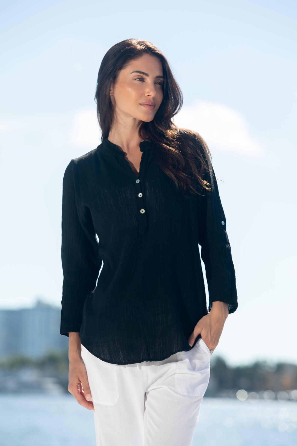 Cotton Natural Linda Top featuring a fitted style with short sleeves and a scoop neckline, in soft, breathable fabric.