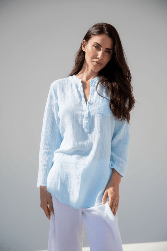 Cotton Natural Linda Top featuring a relaxed fit, soft fabric, and stylish design, shown in a neutral color on a model.