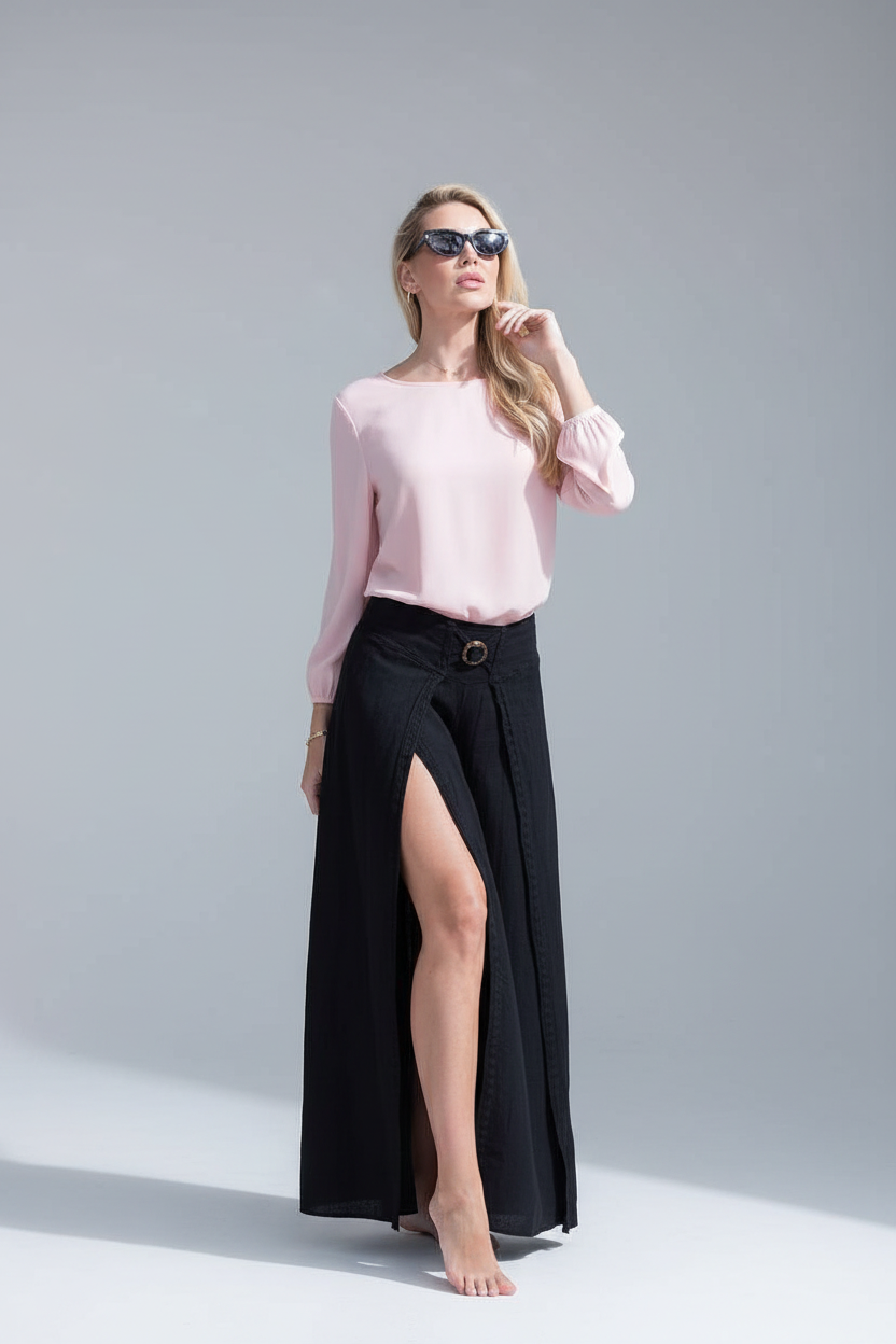 Cotton Natural Milan Pants in neutral fabric, featuring a relaxed fit and stylish design, displayed on a hanger.