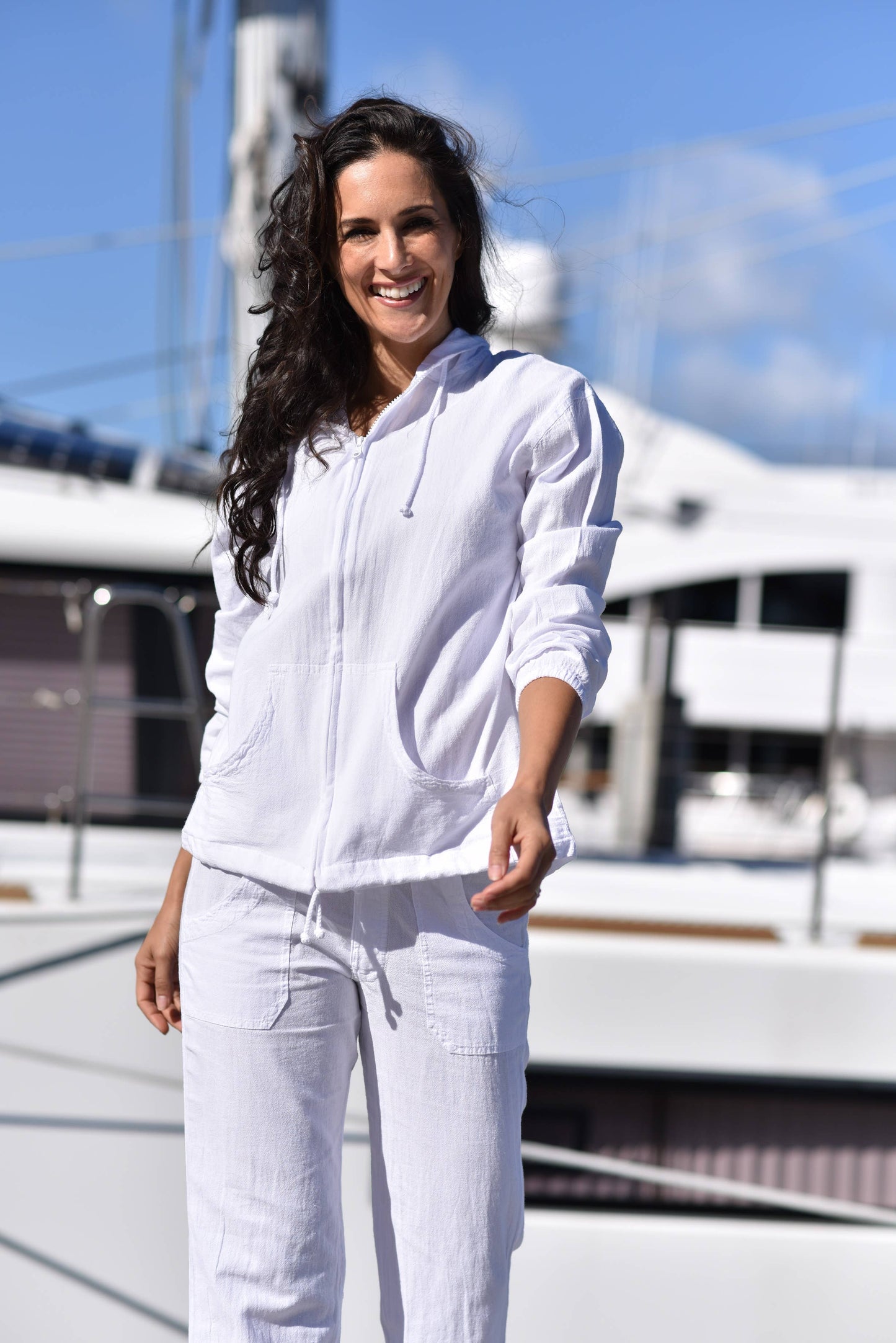 Cotton Natural Wind Jacket in lightweight cotton fabric, shown in a neutral color with a relaxed fit and adjustable hood.