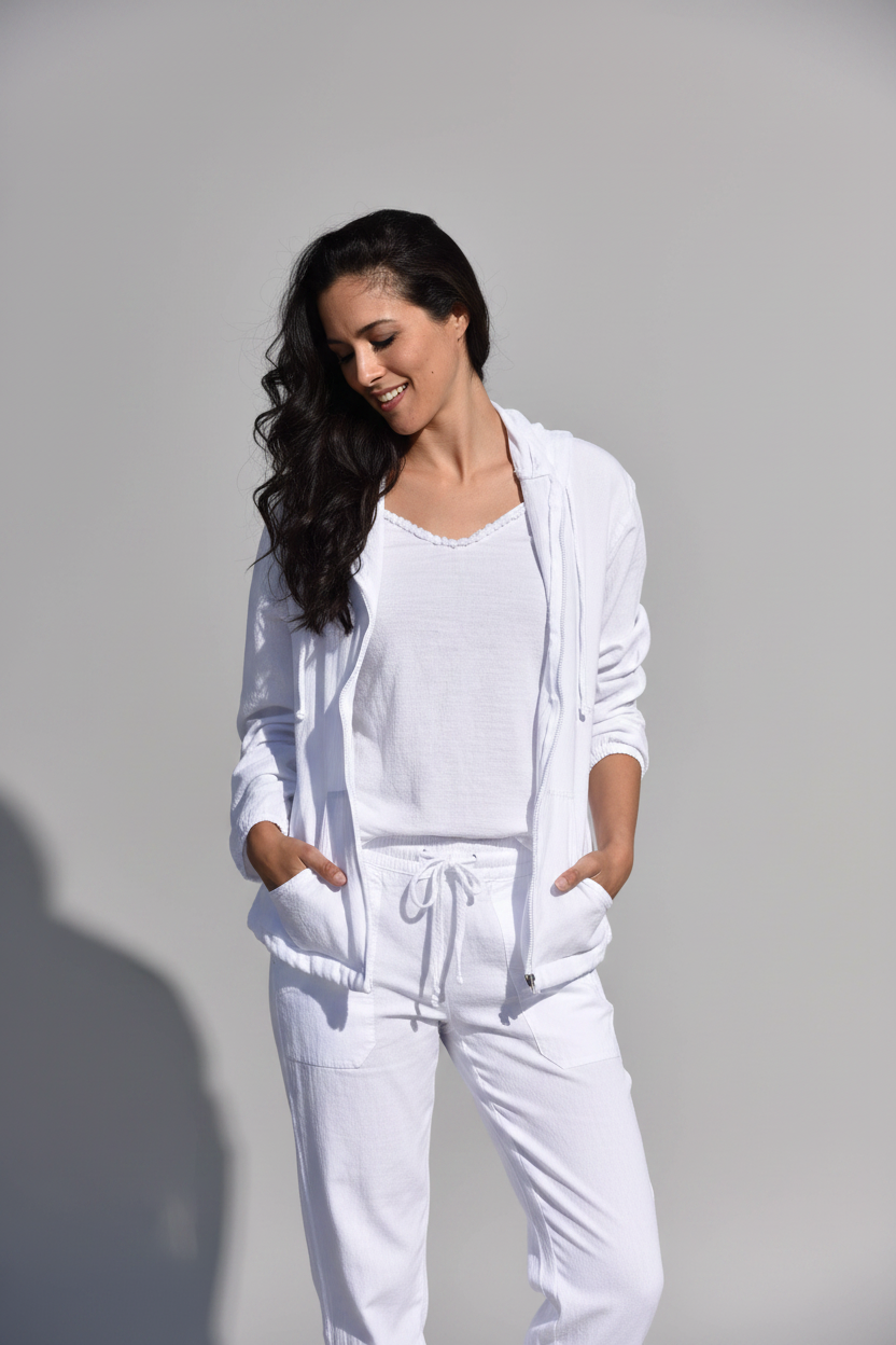 Light gray Cotton Natural wind jacket made of soft cotton fabric, featuring a front zipper and adjustable hood.