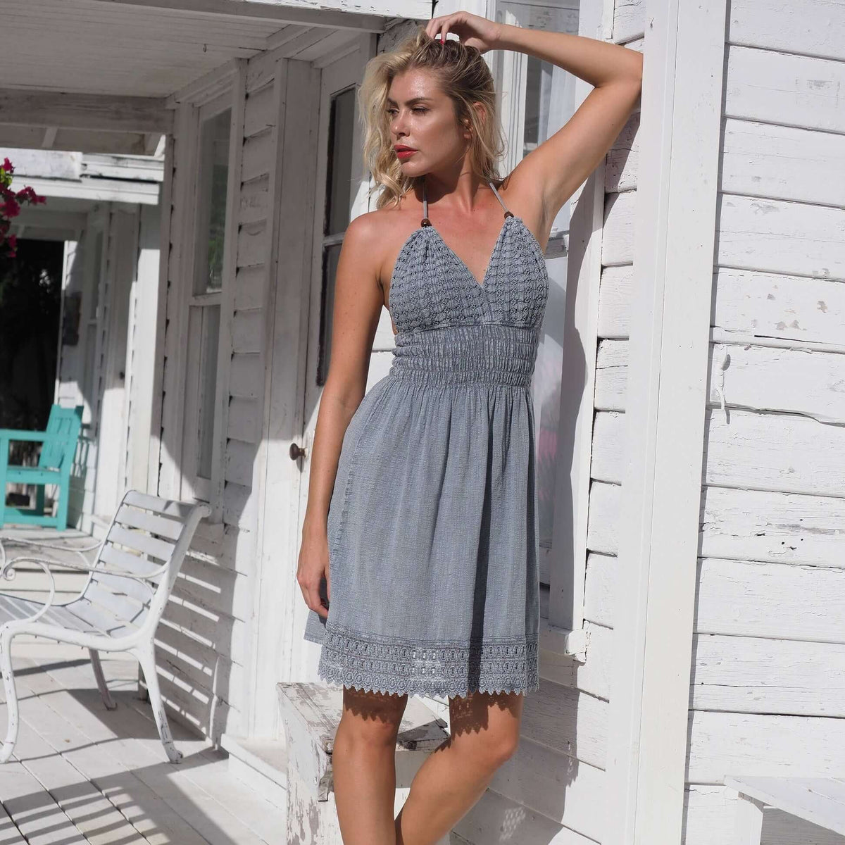 Martinique Fossil Gray Cotton Natural dress displayed on a hanger, showcasing its casual style and soft fabric texture.