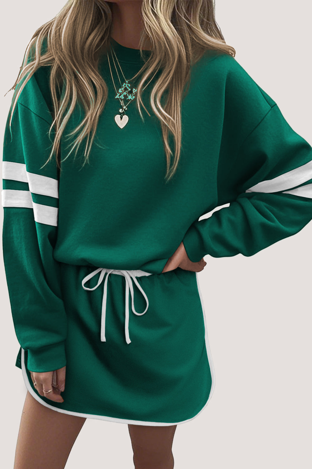CSB Private Label evergreen sweatshirt and skirt set, featuring a cozy sweatshirt and matching skirt for casual wear.