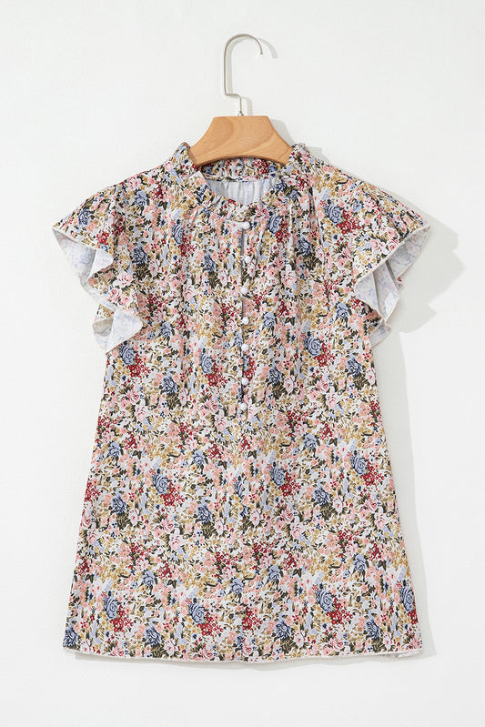 Short sleeve floral blouse by CSB Private Label featuring a colorful floral pattern and lightweight fabric.