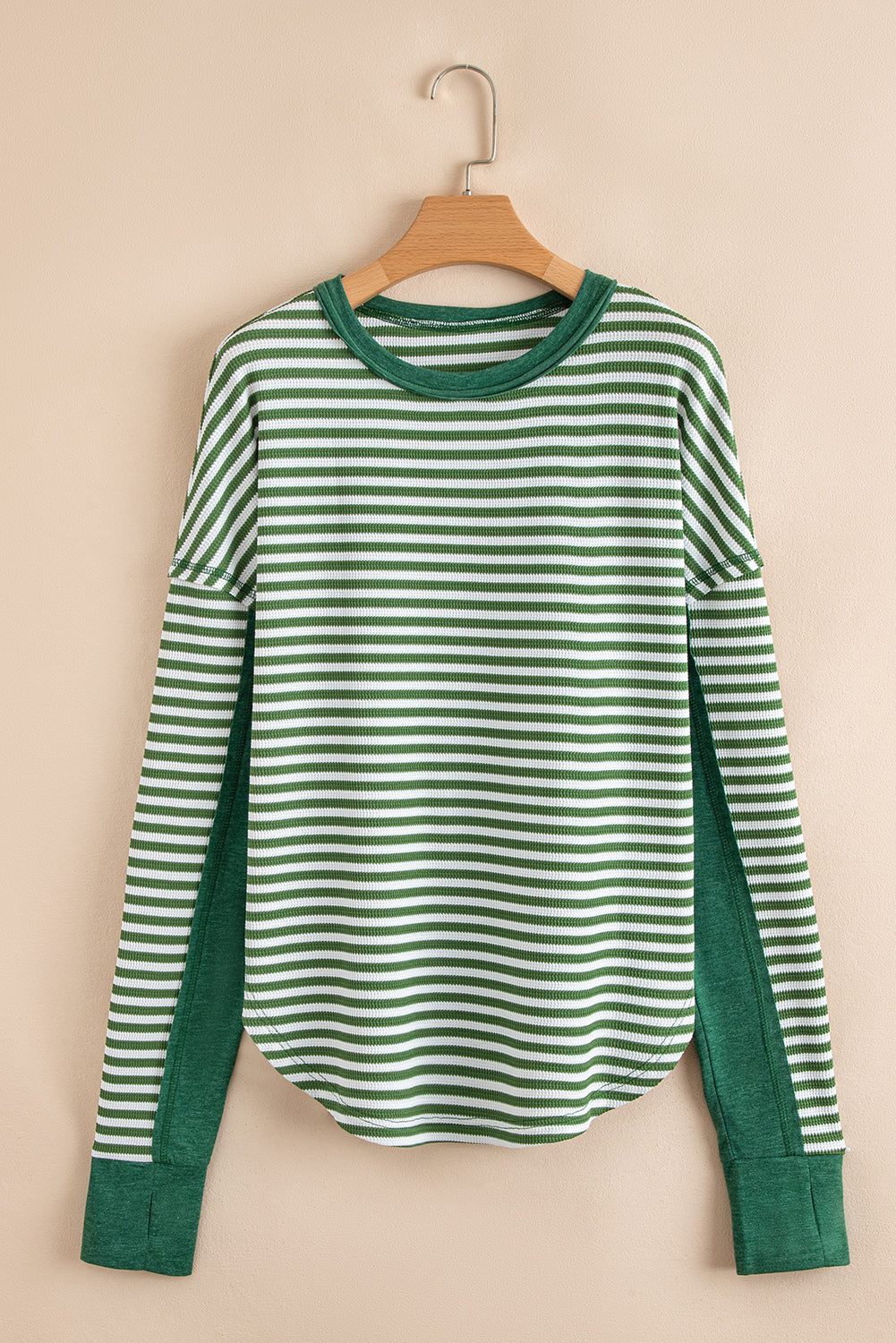 Green stripe long sleeve T-shirt from CSB Private Label with a relaxed fit and ribbed cuffs, shown on a hanger.