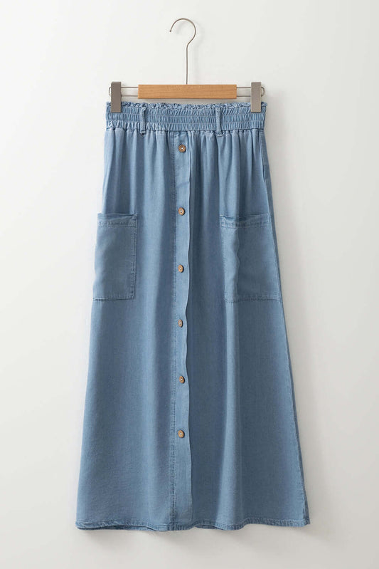 High waisted Beau blue skirt from CSB Private Label displayed on a hanger, showing its fabric and fit details.