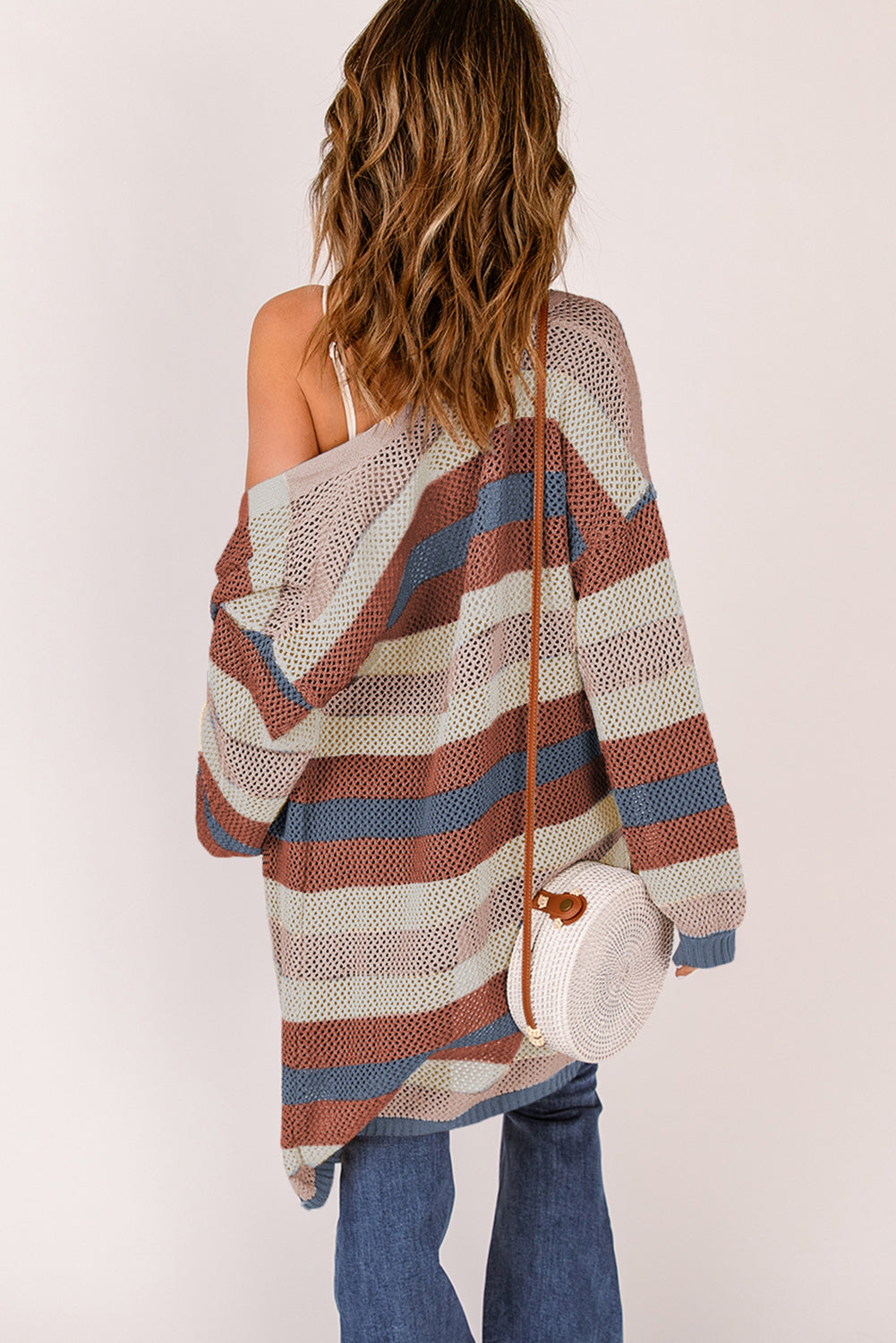 Knit long striped cardigan by CSB Private Label, featuring multicolored horizontal stripes and a cozy, relaxed fit.