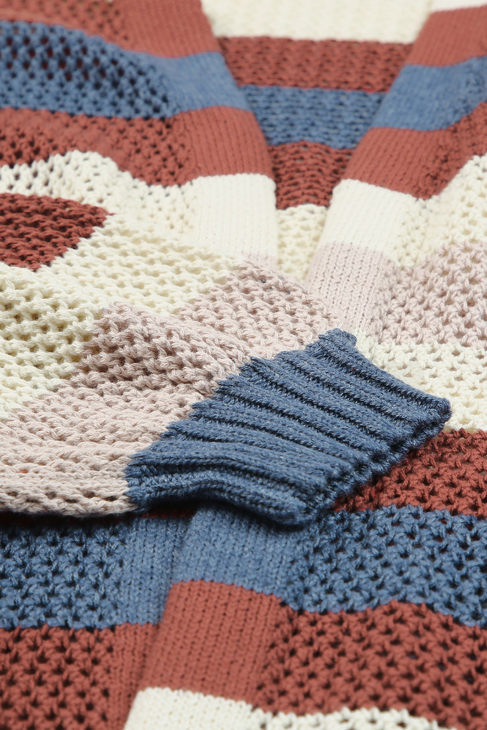 Knit long striped cardigan by CSB Private Label featuring multicolored horizontal stripes and a cozy, relaxed fit.