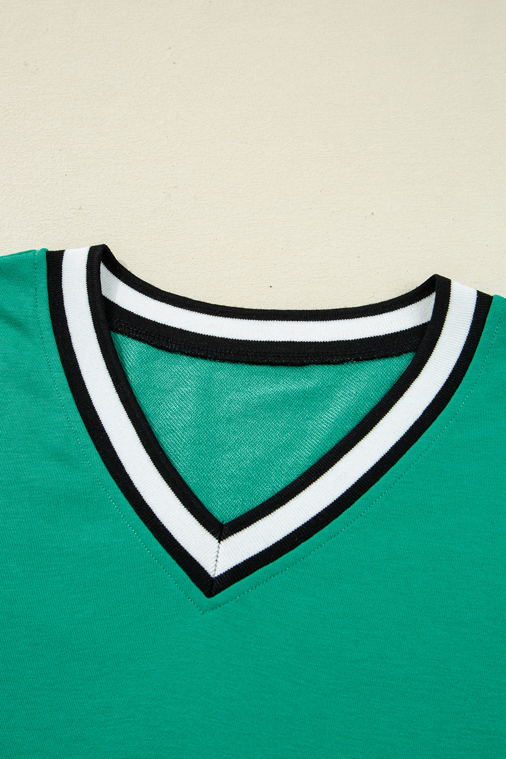 Mint green contrast trim V-neck sleeveless mini dress by CSB Private Label, featuring a stylish V-neck and sleeveless design.