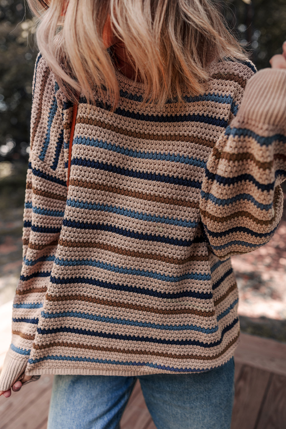 Multicolor striped knit sweater by CSB Private Label showing vibrant, cozy sweater with bold stripe patterns and soft knit fabric.