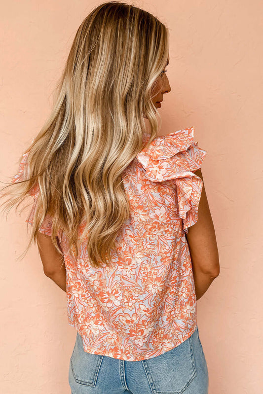 Orange floral ruffle sleeve split neck blouse by CSB Private Label, featuring a feminine design with ruffles and a V-neck collar.