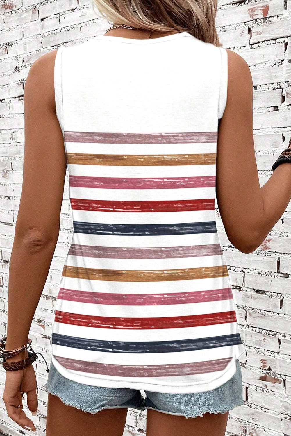 Red rainbow striped round neck tank top by CSB Private Label, featuring vibrant multicolor horizontal stripes and a casual fit.