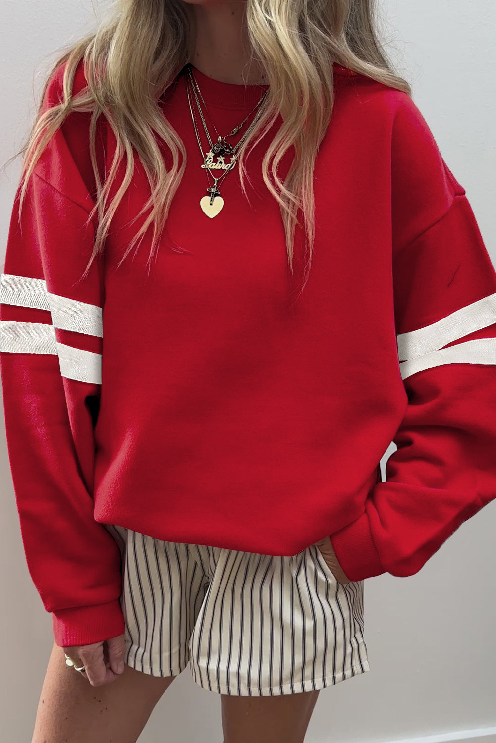 Fiery red CSB Private Label sweatshirt with a cozy fit and ribbed cuffs, displayed on a plain background.