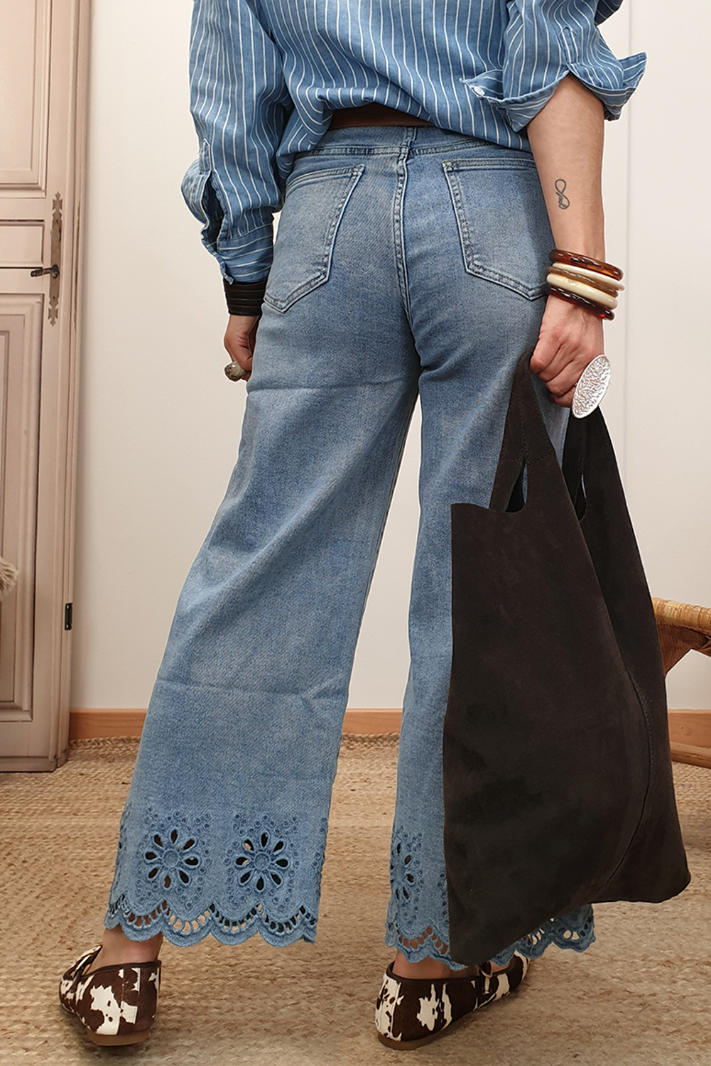 Dusk blue embroidered cropped wide-leg high-waist jeans by CSB Private Label, showcasing detailed embroidery and relaxed fit.