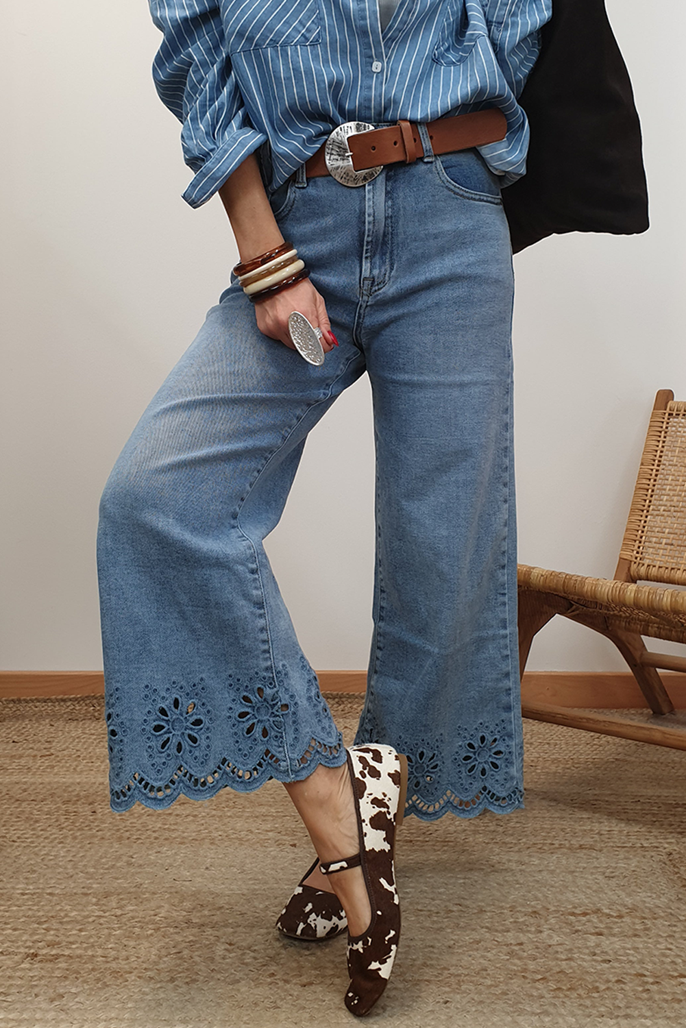 Dusk blue embroidered cropped wide-leg high waist jeans by CSB Private Label, showcasing detailed embroidery and relaxed fit.