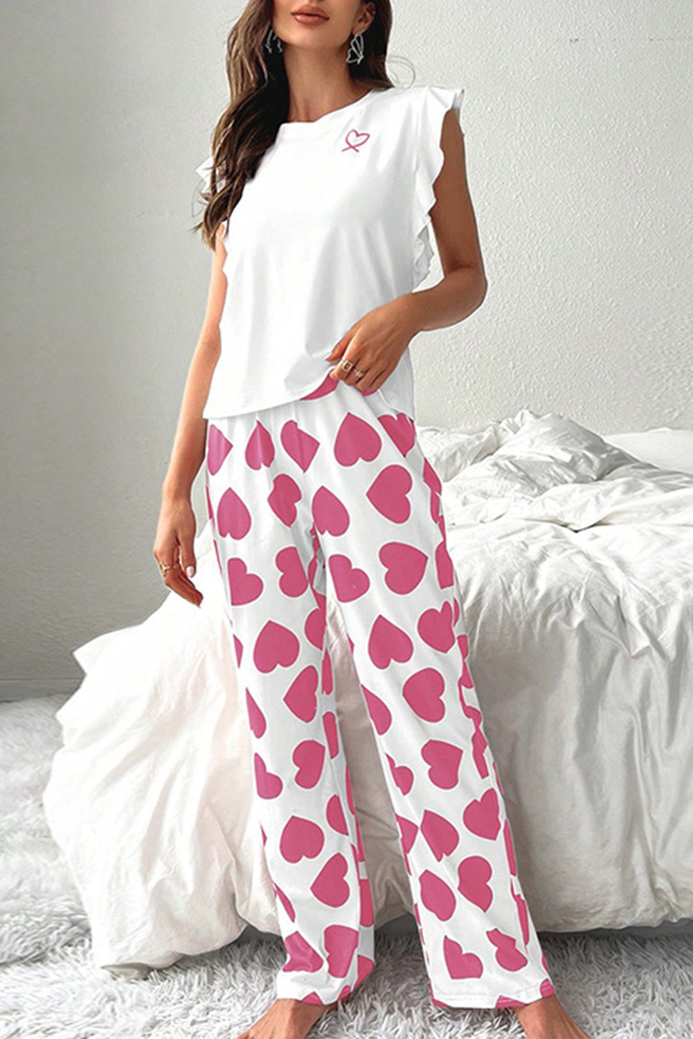 CSB Private Label Heart Loungewear Set featuring cozy top and pants with heart pattern, perfect for comfortable, stylish relaxation.