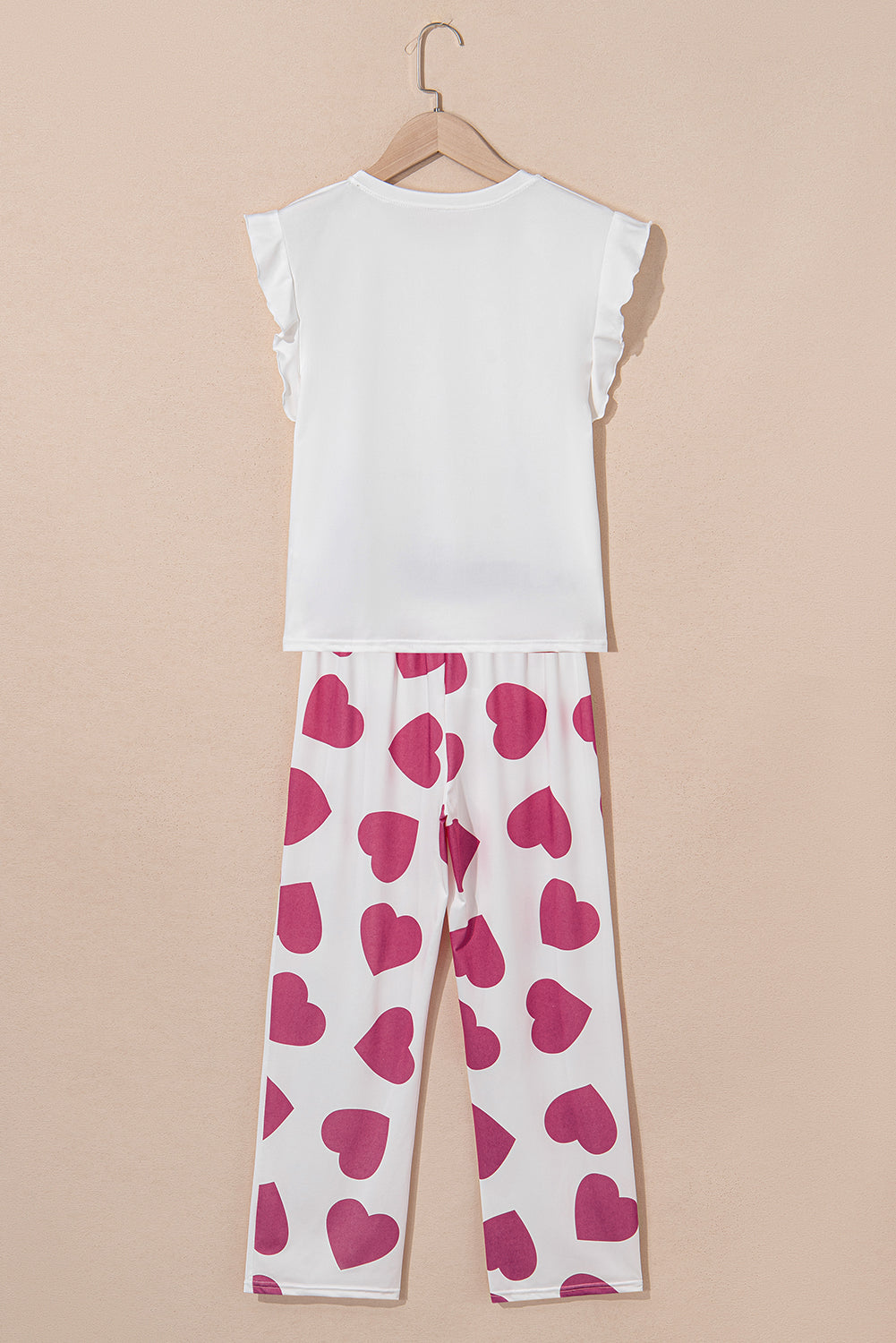 Comfortable heart-patterned loungewear set by CSB Private Label featuring a cozy top and matching bottoms in soft fabric.