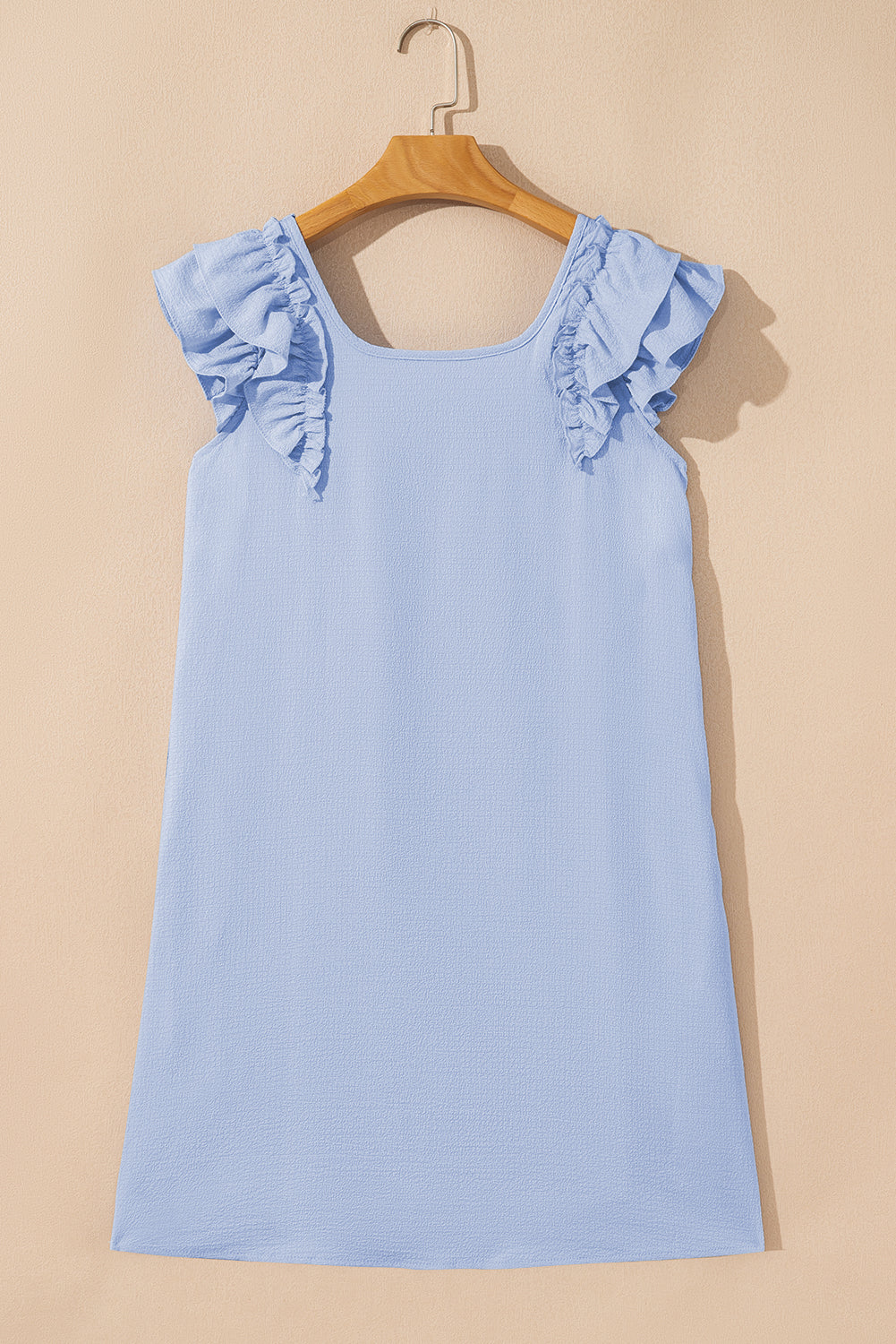 Elegant short dress with a bow detail by CSB Private Label, featuring a stylish fit and feminine design.