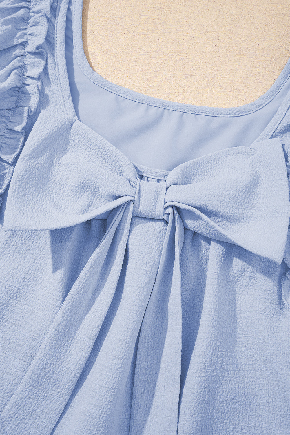 Short dress with bow detail from CSB Private Label, featuring a stylish and elegant design perfect for casual or semi-formal wear.
