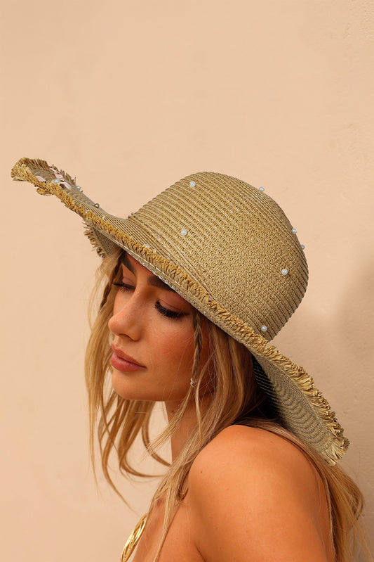 Camel woven flower sun hat with wide brim and decorative flower embellishments, ideal for sun protection and stylish outdoor wear.