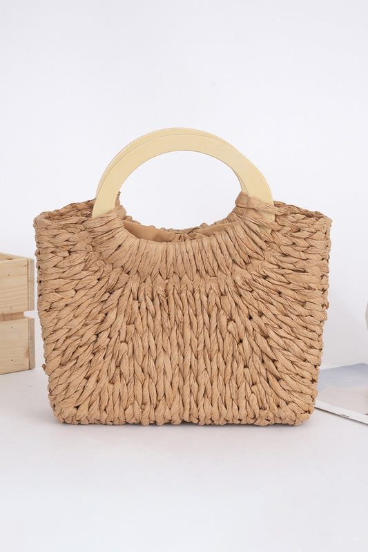 Camel woven straw tote bag with shoulder straps and woven texture, stylish and spacious for casual outings.