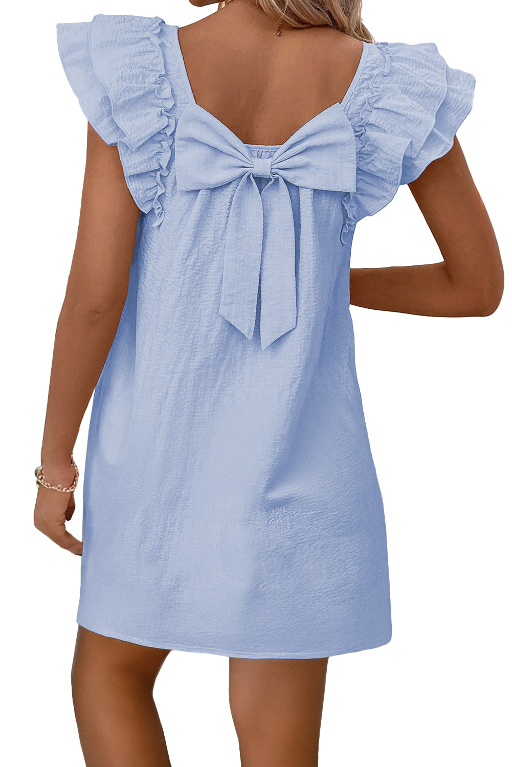 Light blue bow dress by CSB Private Label featuring a charming bow detail and feminine design, perfect for casual or special occasions.