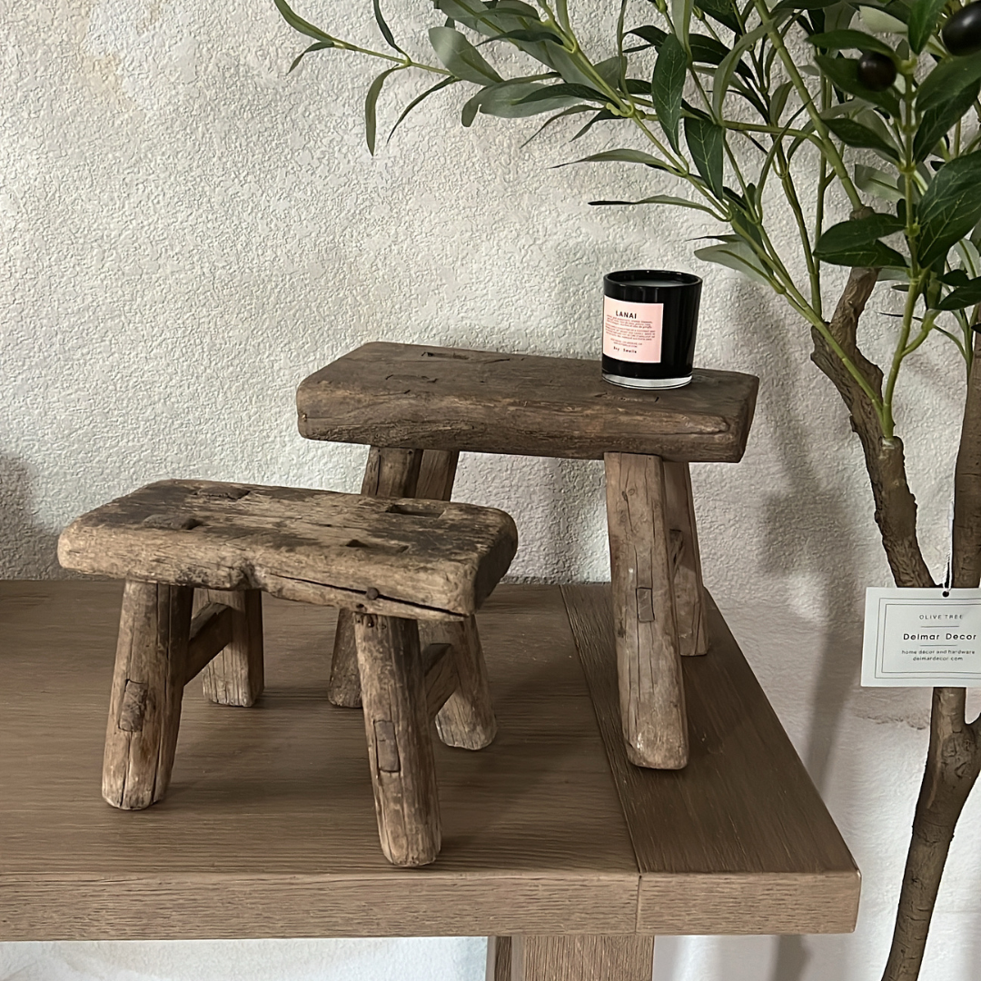 Raw elm wood stool with Wabi Sabi design by Delmar Decor, showcasing natural textures and handcrafted craftsmanship.
