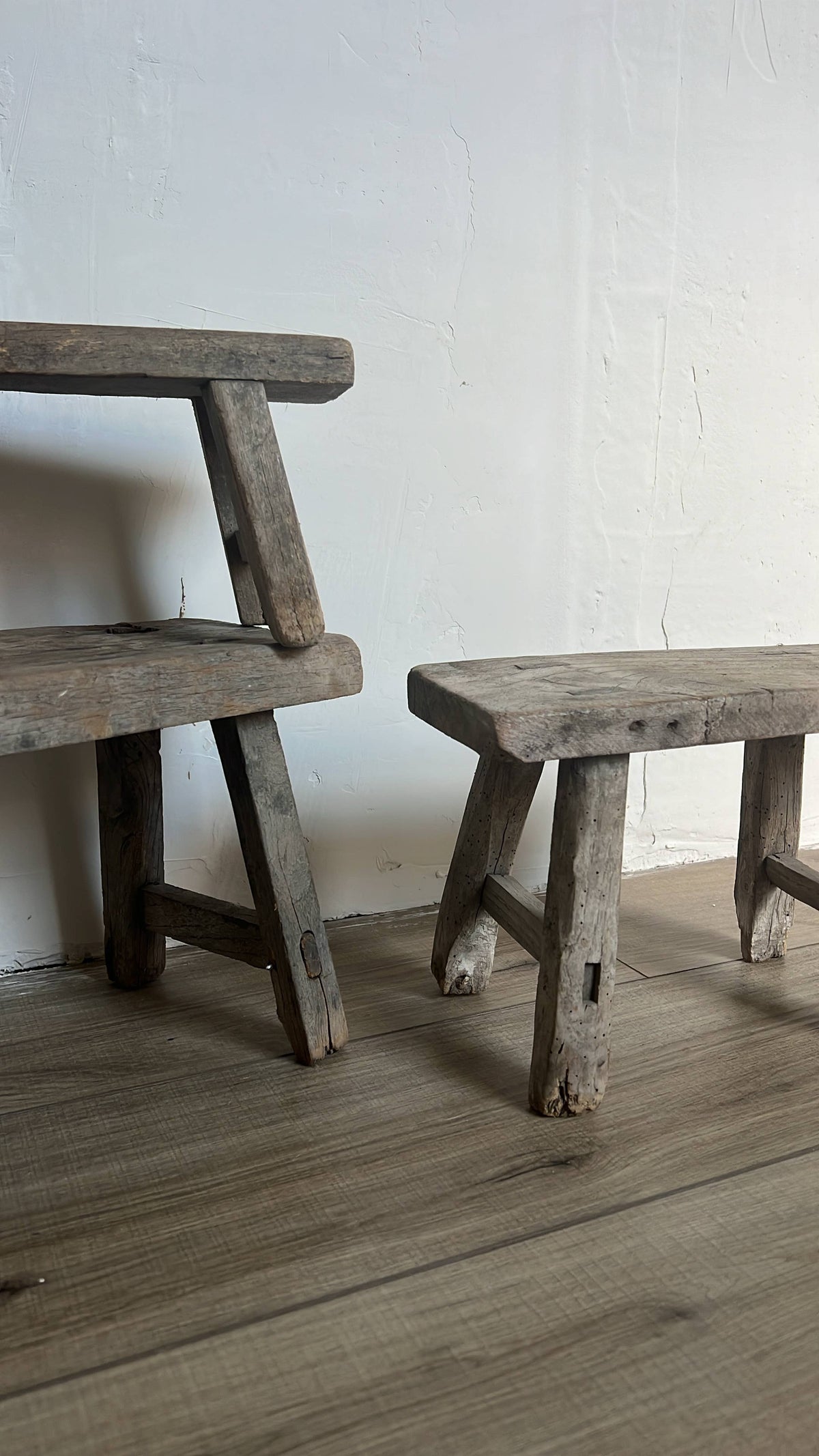 Raw Elm Wood Stool with Wabi Sabi design by Delmar Decor, showcasing its natural grain and handcrafted aesthetic.