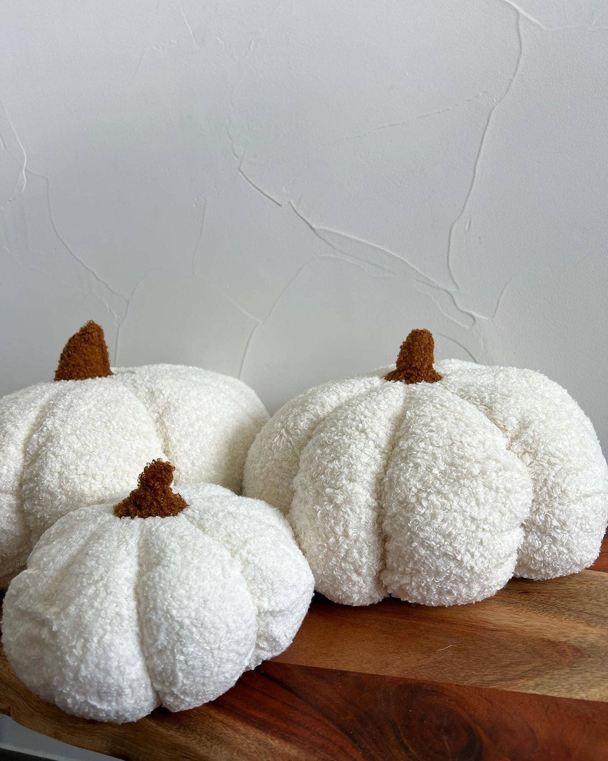 Delmar Decor pumpkin fall boucle pillow, full size with textured orange and beige fabric, perfect for autumn home decor.