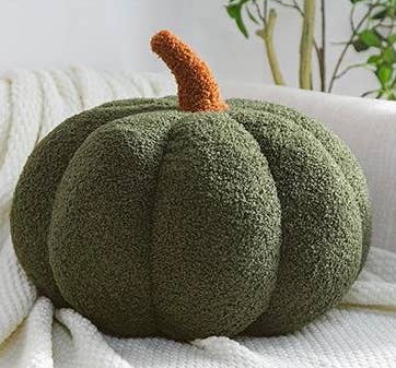 Delmar Decor pumpkin fall boucle pillow showing a cozy, textured autumn-themed pillow with a pumpkin design, full view.