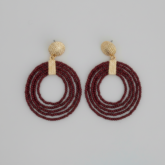 Nickel-free hoop seed bead drop earrings by Howard's featuring colorful seed beads and lightweight design.