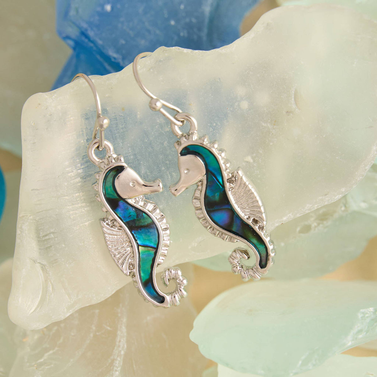 Elsie & Zoey abalone sea horse earrings featuring beach-inspired jewelry with colorful, detailed sea horse designs.