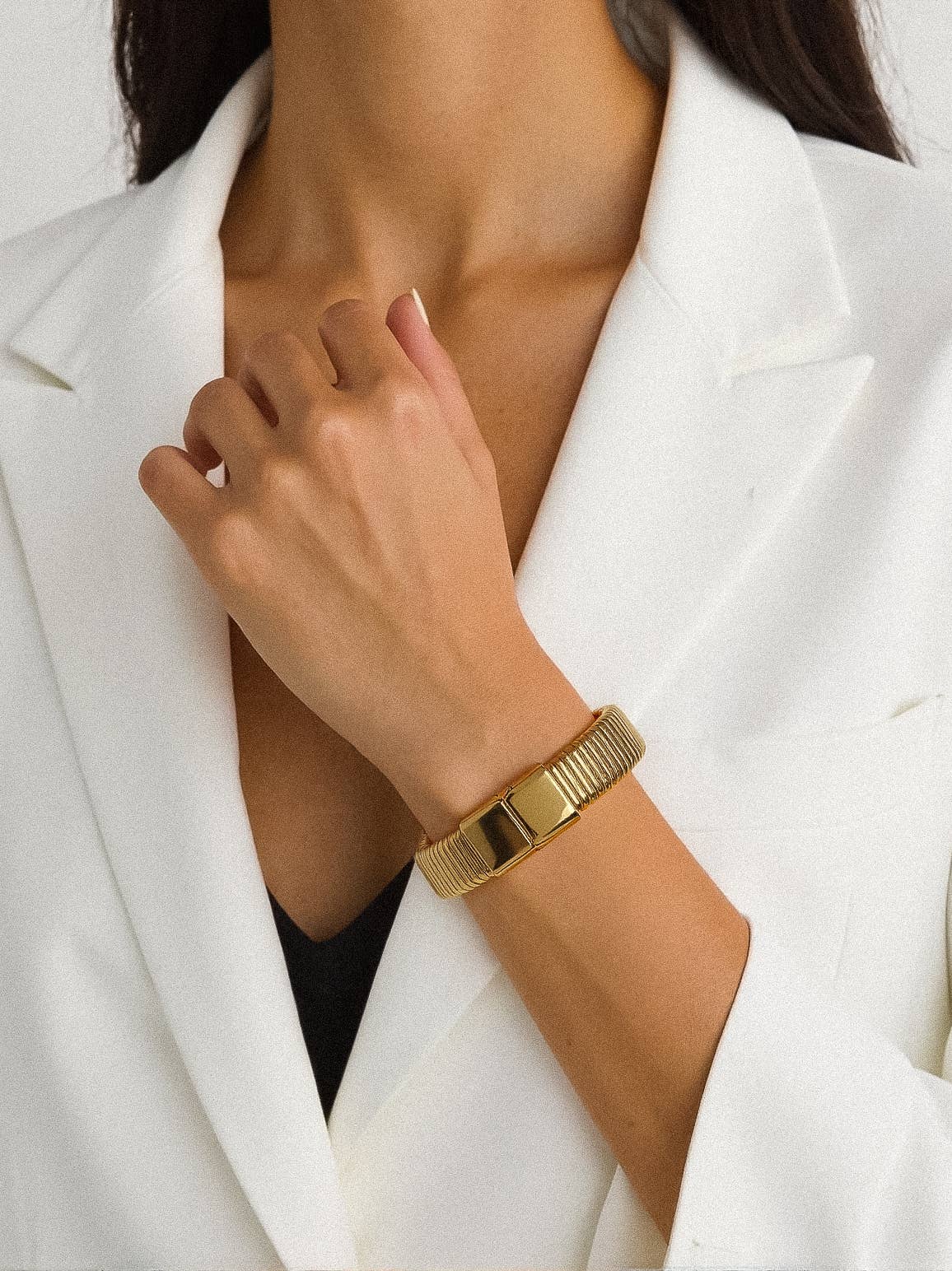 Christel 18K gold non-tarnish stripe bold bangle by Flanerie by MAIQ with sleek gold finish and modern striped design.