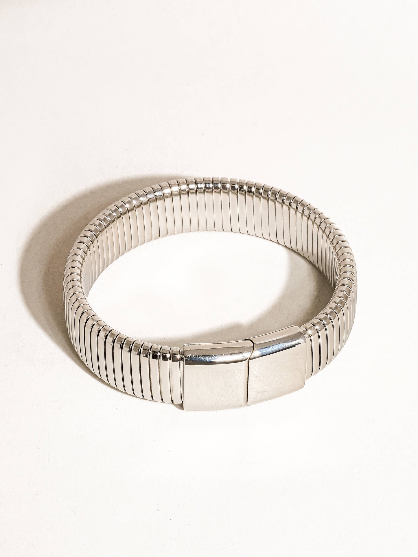 Christel 18K gold non-tarnish stripe bold bangle by Flanerie by MAIQ, featuring a sleek gold finish and modern design detail.
