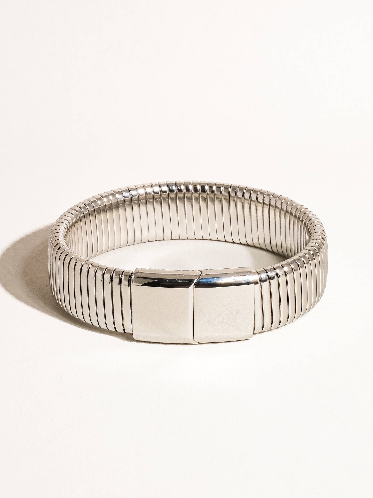 Christel 18K gold non-tarnish stripe bold bangle by Flanerie by MAIQ, featuring a sleek gold finish and modern striped design.