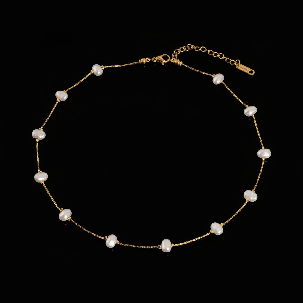 Ida 18K non-tarnish petite pearl necklace by Flanerie by MAIQ, featuring a delicate string of lustrous pearls.