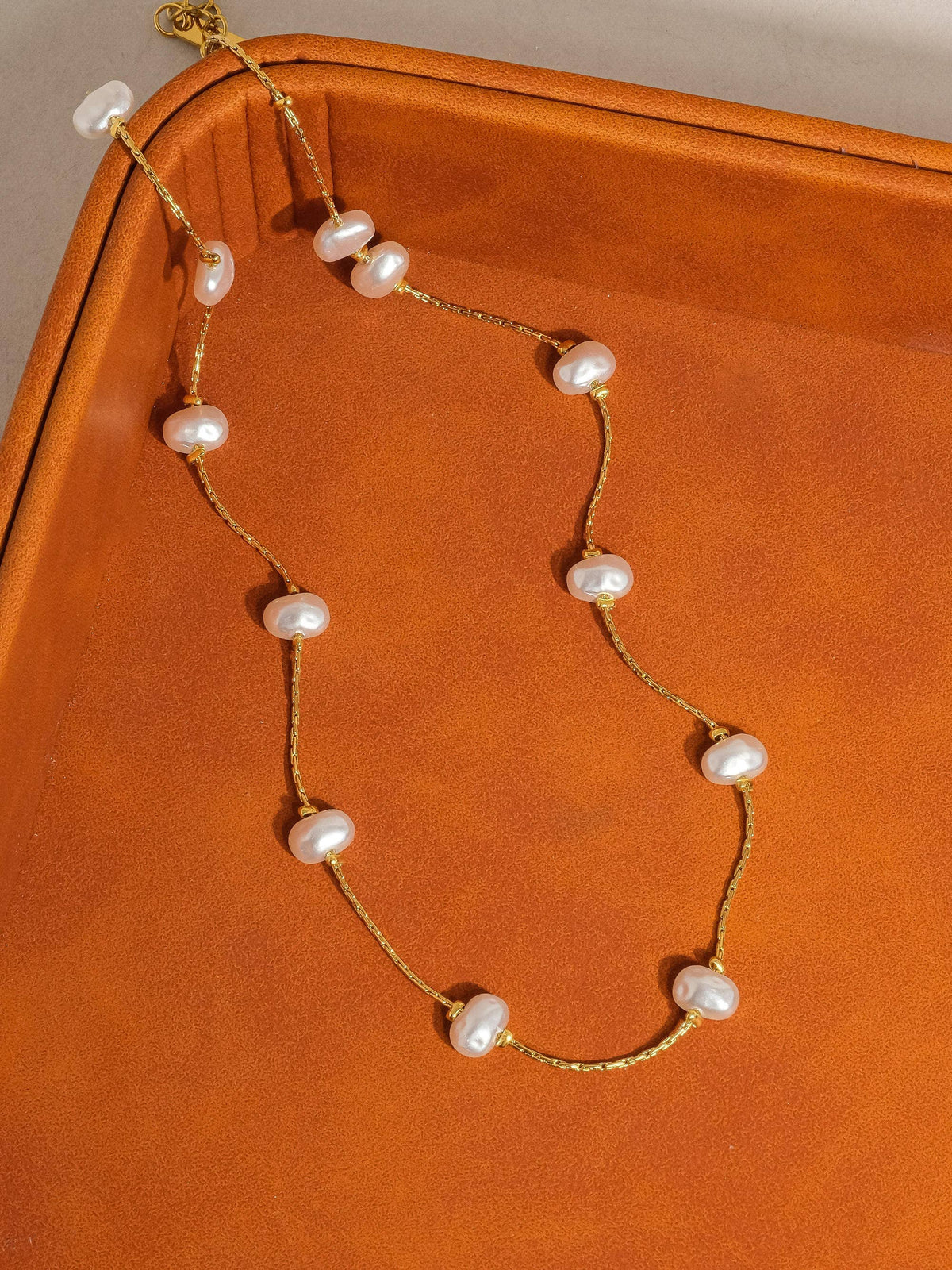 Ida 18K non-tarnish petite pearl necklace by Flanerie by MAIQ, featuring a delicate string of lustrous pearls.