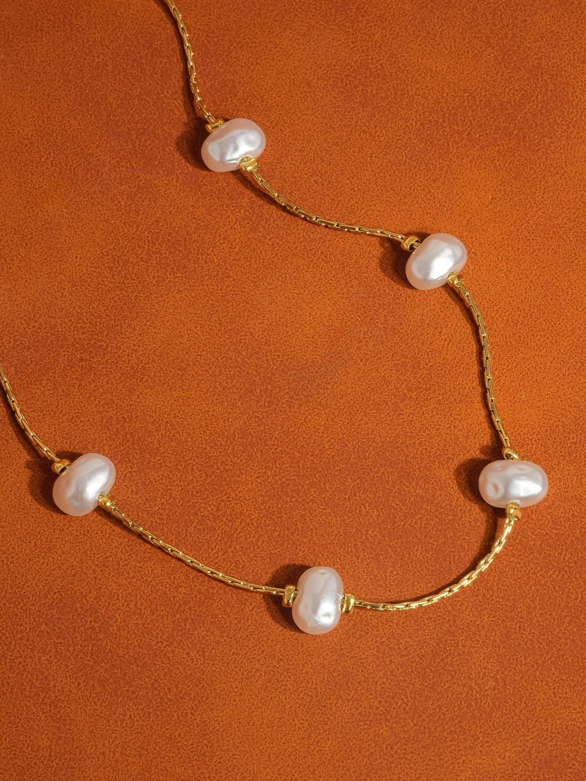 Flanerie by MAIQ Ida 18K non-tarnish petite pearl necklace with delicate white pearls on a fine chain.
