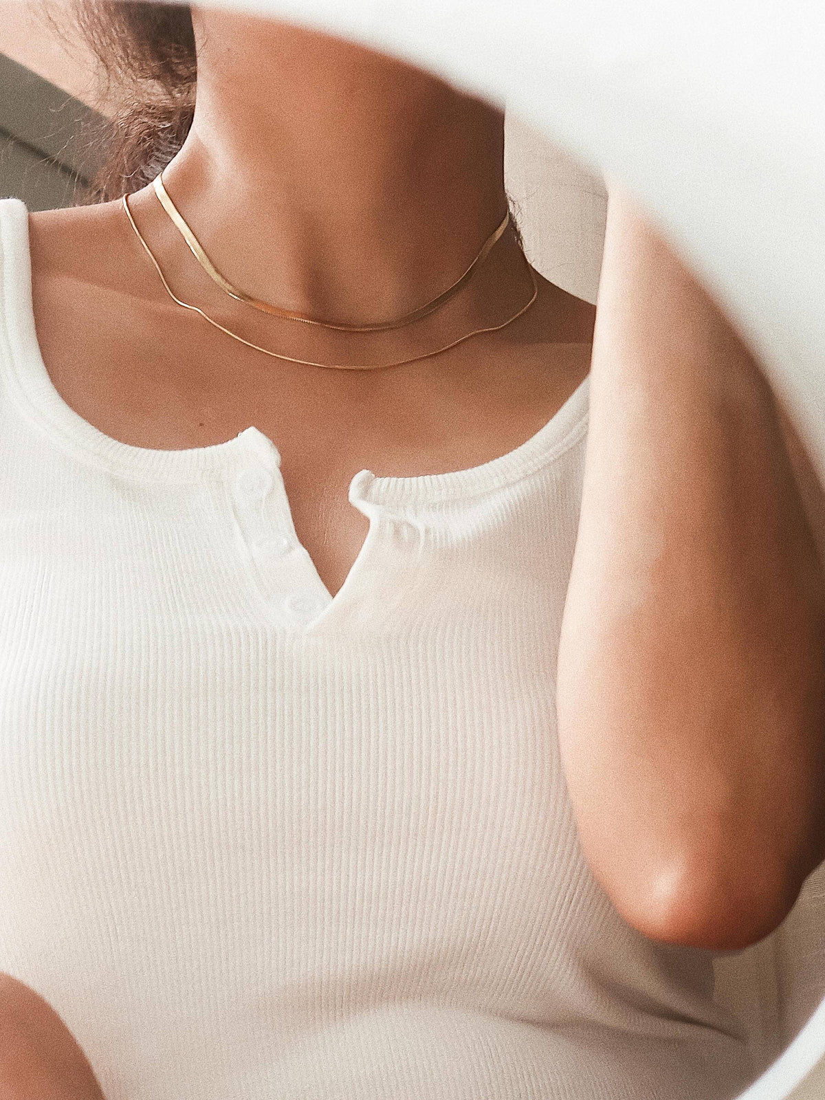 18K gold layered flat snake chain necklace by Flanerie by MAIQ, featuring a non-tarnish finish and smooth snake chain design.