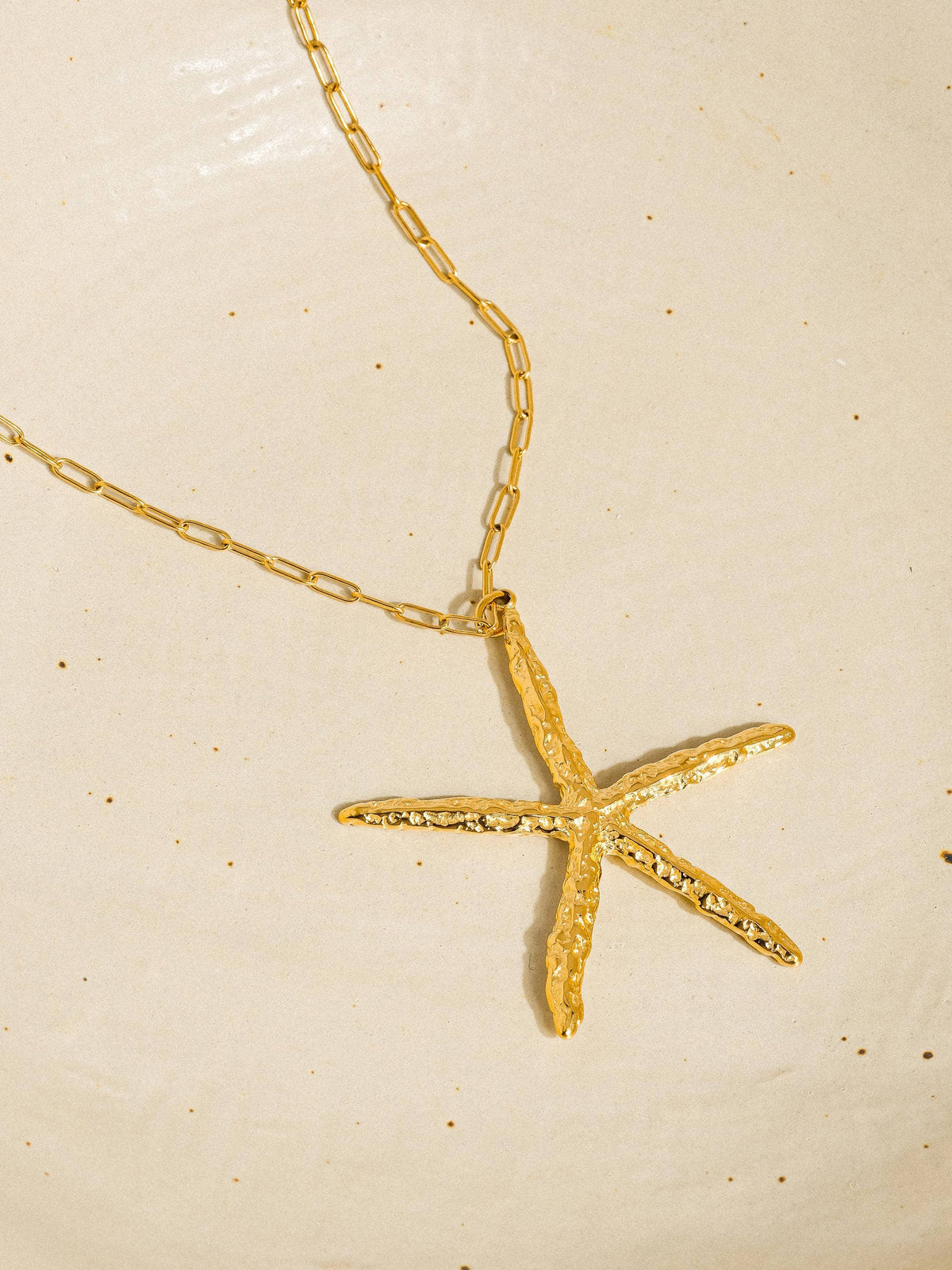 Suki 18K gold non-tarnish star necklace by Flanerie by MAIQ, featuring a delicate star pendant on a fine chain.