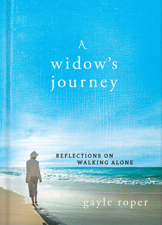 Hardcover copy of "A Widow's Journey" by Harvest House Publishers, featuring a book cover with warm, reflective design.