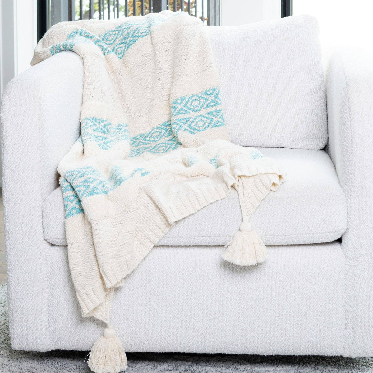 Howard's Necalli striped cotton decorative knit throw blanket in 50x60 inches, showcasing soft fabric and stylish striped pattern.