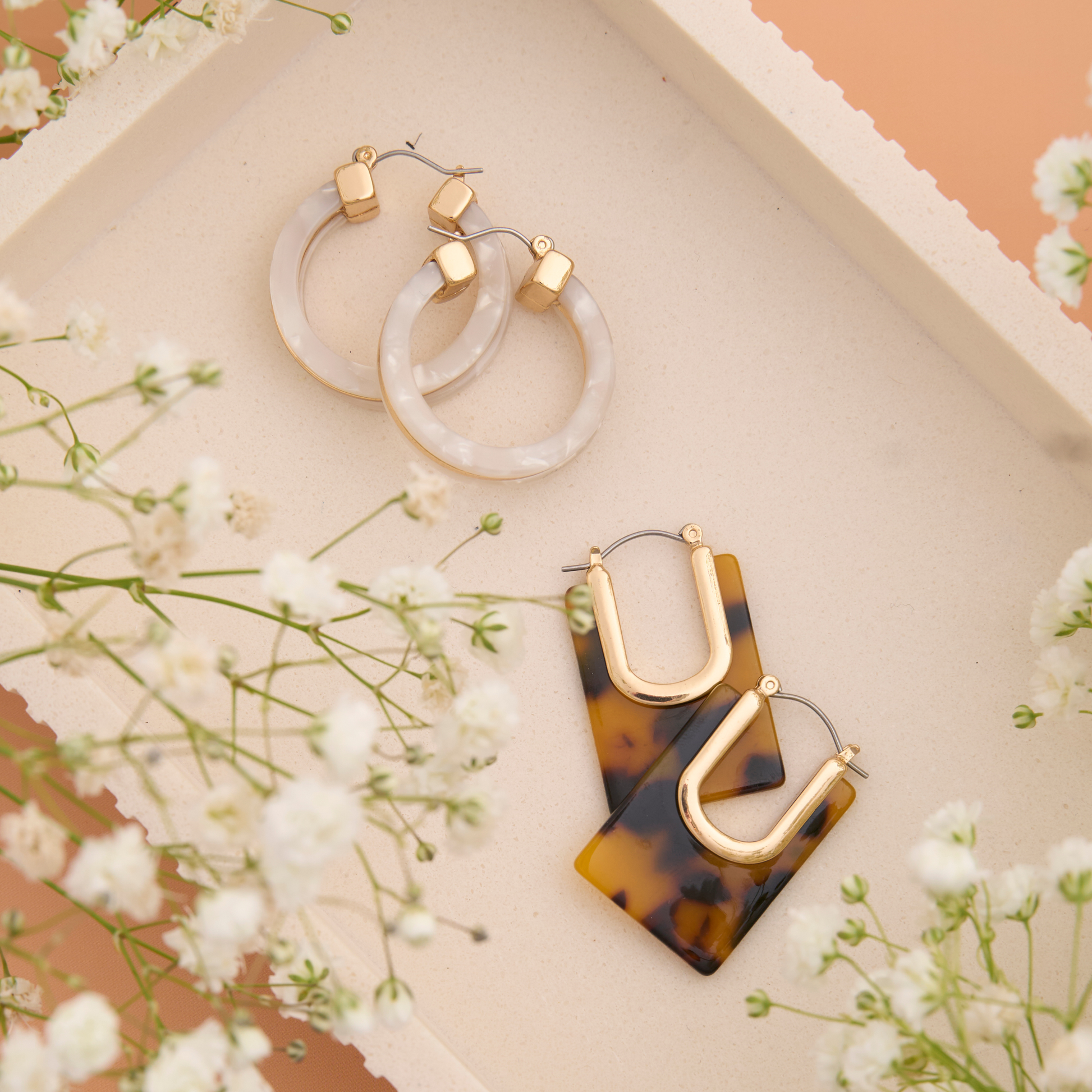 Howard's Sloane Tortoiseshell Circle Acrylic Hoop Earring showing a classic tortoise shell design on a round hoop style earring
