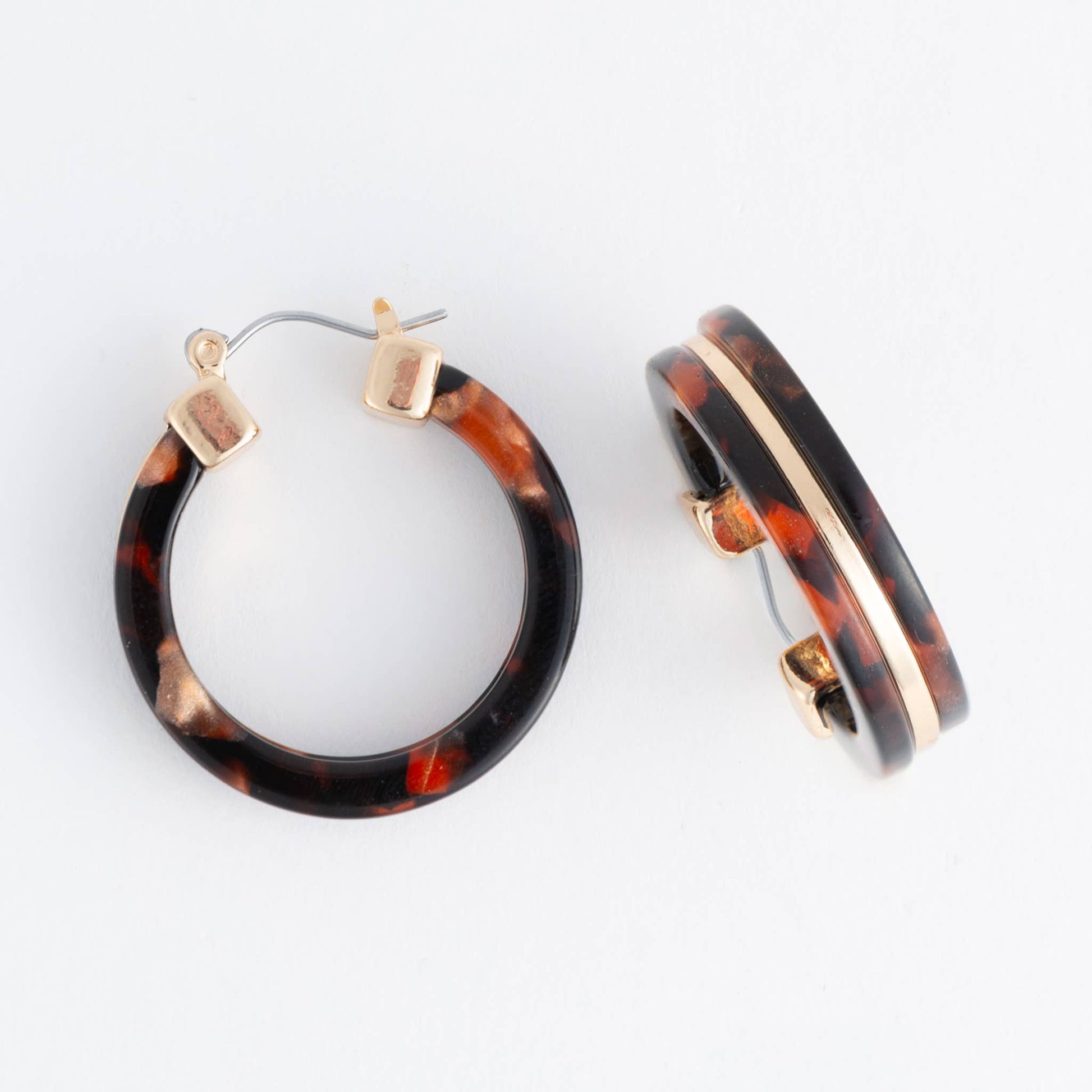 Howard's Sloane Tortoiseshell Circle Acrylic Hoop Earring showing a classic tortoise pattern on a round hoop style accessory