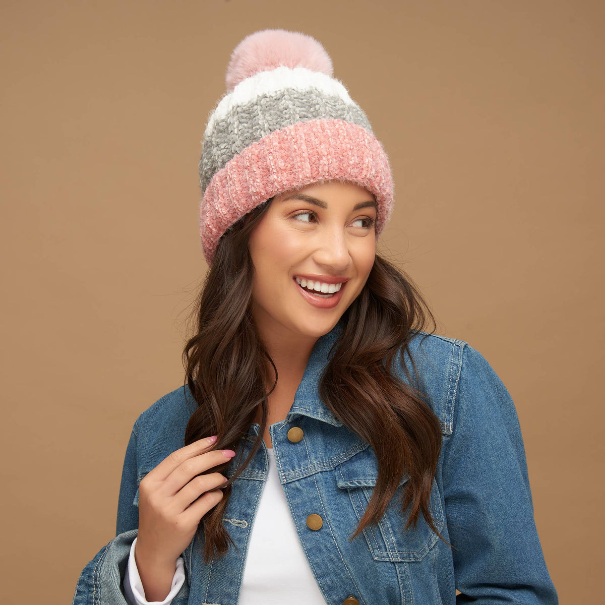Howard's Jemmi chenille striped pom winter beanie hat with colorful knit pattern and a fluffy pom on top.