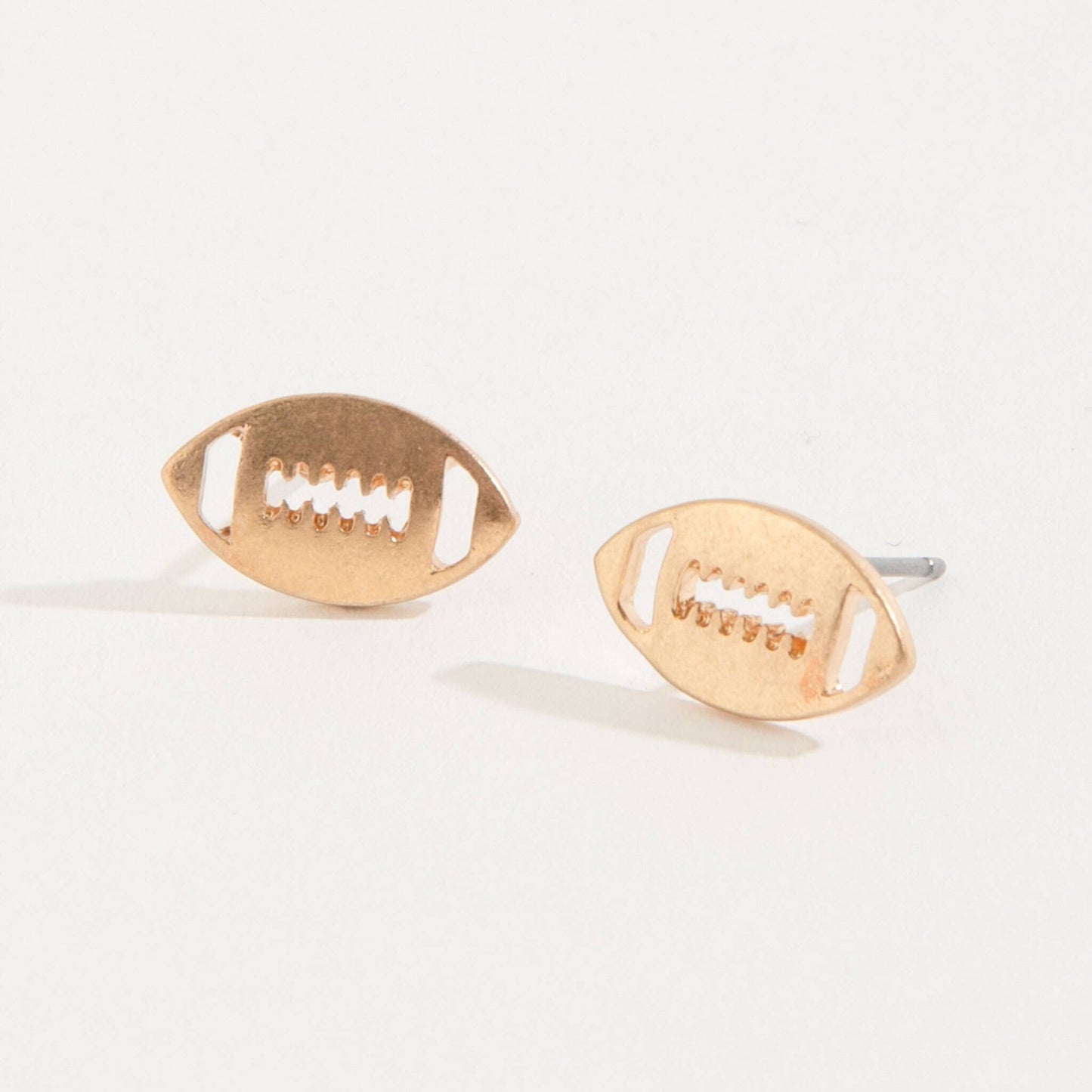 Howard's Football Stud Buds Earrings featuring small football-shaped studs with ear buds for a sporty, stylish look.