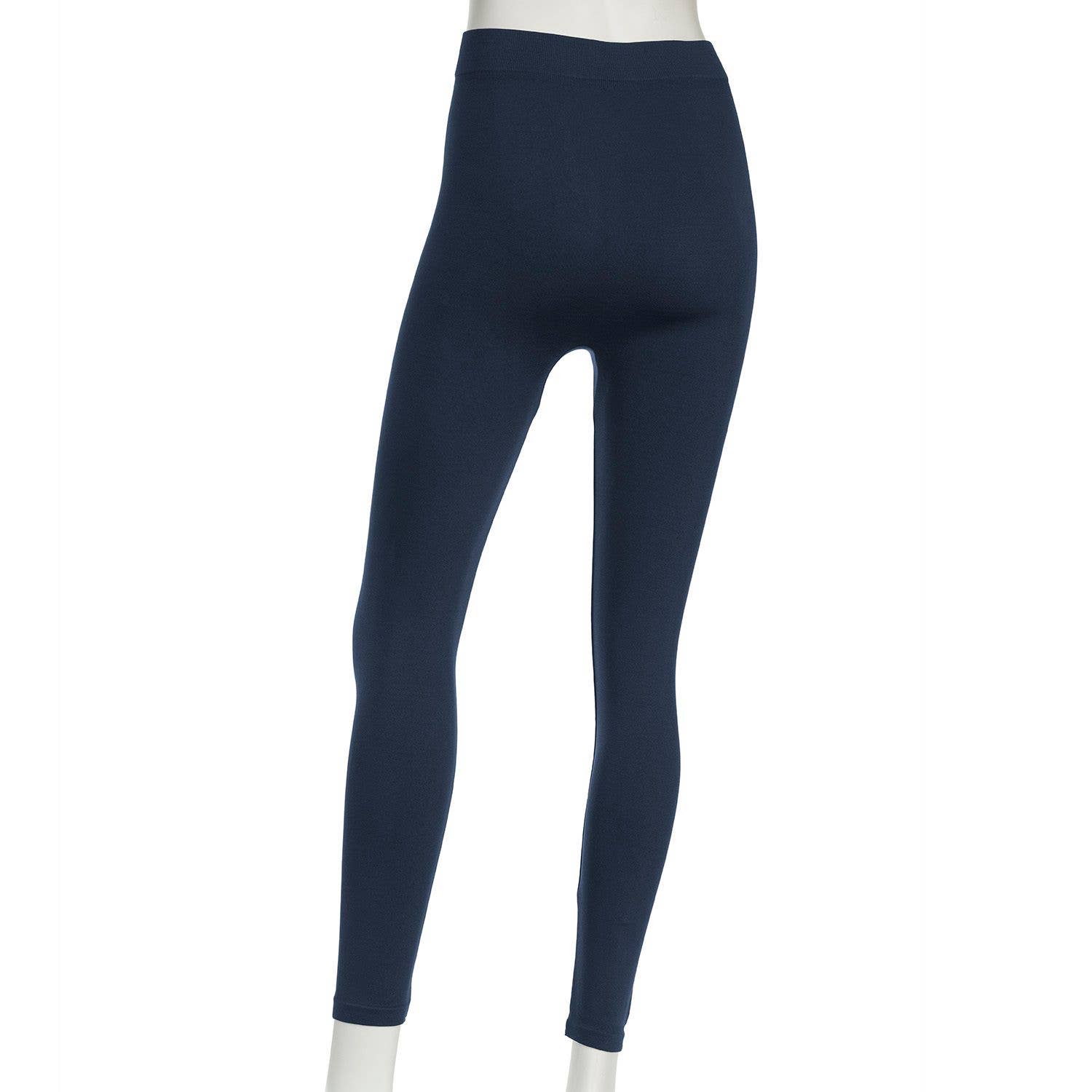 Stretchy basic leggings by Howard's, soft and comfortable, shown in a close-up of the black fabric and elastic waistband.
