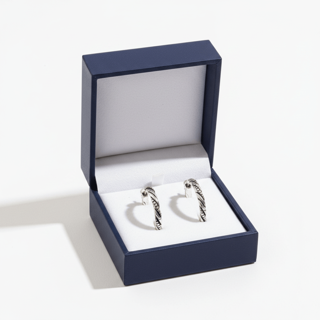 Howard's Earsense Twist Hoop Earrings in silver with twisted hoop design, lightweight and stylish for everyday wear.