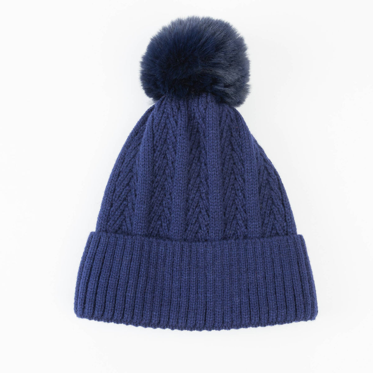 Howard's Roxanne Knit Pom Lined Beanie Hat featuring a cozy knit design and playful pom pom on top.